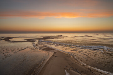 Wall Mural - frozen sunset at the beach