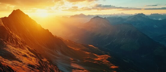 Wall Mural - Golden Sunset Over Majestic Mountains