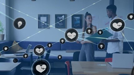 Sticker - Animation of network of connections with heart icons over diverse business people in office