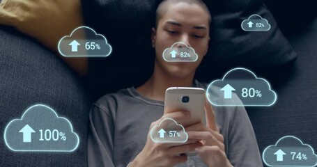 Poster - Animation of cloud icons over biracial man using smartphone
