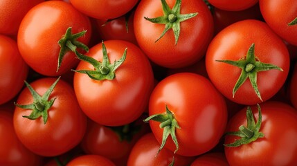 Fresh ripe tomatoes with green stems in a close-up view. Ideal for healthy eating, organic produce, and cooking ingredients.