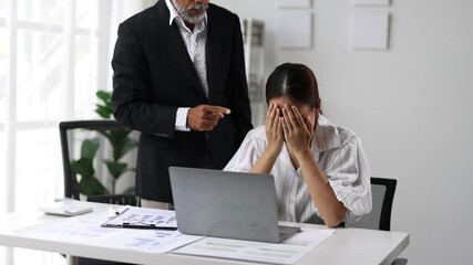 Wall Mural - Stressed businesswoman reacts to supervisor's criticism in office. Struggling, she buries her face in hands, showing signs of pressure and frustration.