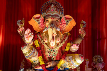 A Closeup shot Ganpati Installed in a Pandal during the 10 Day Ganesh Festival, the idols are immersed in heavy water bodies after the 10 days.