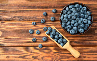 Poster - Blueberry photography in a bowl on rustic background