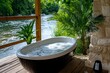 © Sanchai - Outdoor bathtub, riverbank location, peaceful waterside provides the calming sound of flowing water as you unwind in the bath
