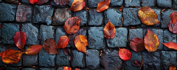 Wall Mural - Autumn leaves on a cobblestone walk