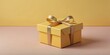© Rein Weissritter - beautiful yellow gift box on a pastel yellow aesthetic background with space for text, concept for Birthday or Christmas or Valentines Day