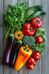 Wall Mural - A variety of vegetables and fruits are displayed on a wooden table. The vegetables include broccoli, peppers, and tomatoes, while the fruits consist of apples and oranges