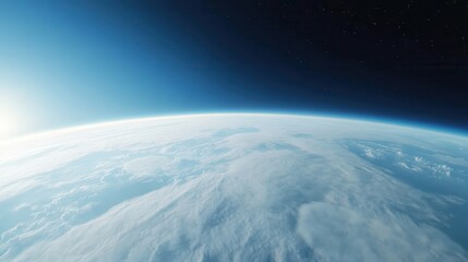 A clear blue sky with a white cloud in the middle