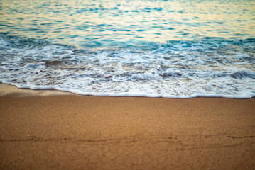 Soft wave of the sea on the sandy beach