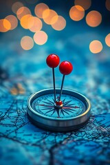 Wall Mural - a compass with red pins positioned on a gently blurred blue map, set against a background of abstrac