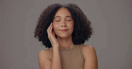 Wall Mural - Woman, curly hair and face in studio with cosmetics, results or confidence with care by background. Person, model and hairstyle for portrait, beauty or transformation with afro for growth in Colombia