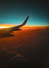 sunset from the wing of the plane