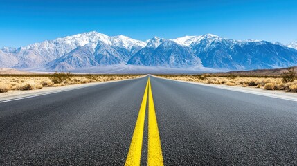 Wall Mural - Empty Road Leading to Snowy Mountains