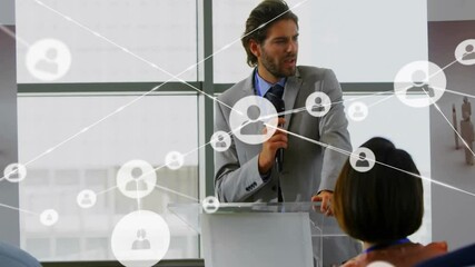 Poster - Animation of network of connections with icons over diverse colleagues at meeting in office
