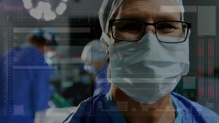 Canvas Print - Animation of data processing over diverse surgeons with face masks during operation