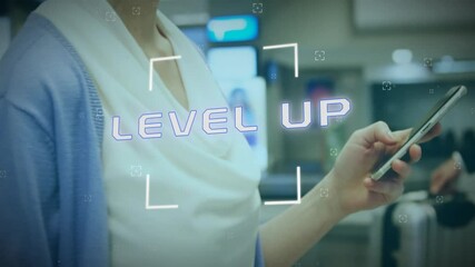 Poster - Animation of level up text over caucasian businesswoman using smartphone