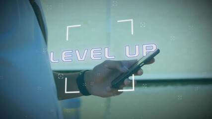 Poster - Animation of level up text over caucasian businessman using smartphone