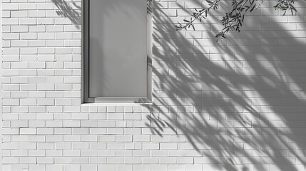 Sticker - A white brick wall with a window and leaf shadows.