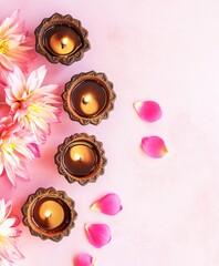 Diwali diya oil lamps with flowers holiday background. Creating a festive and decorative composition.