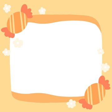 a frame with candy and flowers on it