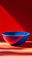 Poster - Blue ceramic bowl on vibrant red background, minimalist composition. Modern art and design concept