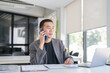 © Charlie's - Asian Business man working with laptop. Young business man thinking Concentrated at work.