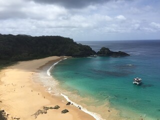 Scenic View of Pristine Beach and Turquoise Waters