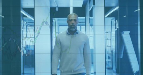 Poster - Animation of financial data processing over african american businessman walking in office
