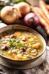 Wall Mural - Soup made from barley groats, smoked pork neck, potatoes and root vegetables