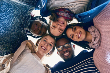 Poster - Students, circle and portrait in low angle with smile, diversity and hug for support, connection or college education. People, women and men with learning, happy and scholarship for friends in Canada