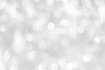 abstract blurred shiny silver bokeh background, holiday and festive season concept background