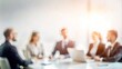 © N7 - Business Team Meeting Blur - Blurred background of a business team meeting.
