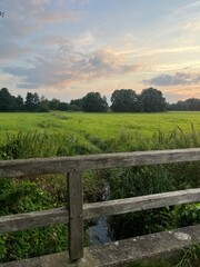 Wall Mural - Fantastic evening sky in field in the countryside, fantastic heavens