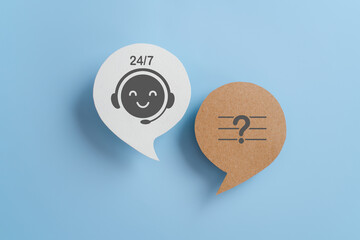 For 24 hours 7 days, all day all night   customer service concept. Smile face on white real speech bubble paper cut and question mark on brown with blue background