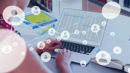 Poster - Animation of network of connections with icons over caucasian businesswoman using laptop in office