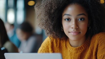 Wall Mural - Smiling African-American Woman in a Business Casual Setting