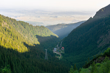 view in to the distant rural valley. mountainous countryside landscape. forested hills. beautiful na