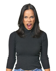 Wall Mural - simple portrait of a young latina shouting very angry, rage concept, frustrated.
