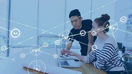Wall Mural - animation of network of connections with graph icons over diverse business people in office