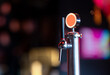 © KONSTANTIN SHISHKIN - Beer tap standing alone waiting for bartender