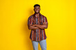 © deagreez - Photo of nice young man folded arms posing wear shirt isolated on yellow color background