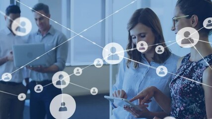 Poster - Animation of network of connections with icons over diverse colleagues discussing work in office
