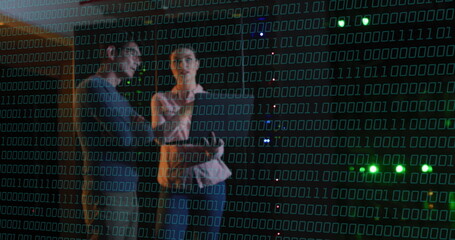 Poster - Binary code over people discussing in data center