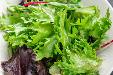 green salad bowl leaves mix fresh meal food snack on the table copy space food background rustic top view