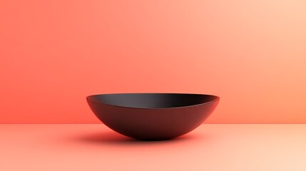 Wall Mural - A black bowl sits on a table in front of a pink wall