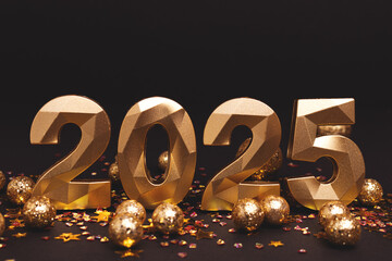 2025 - New Year creative concept with place for text. Golden numbers and confetti in front of black background.