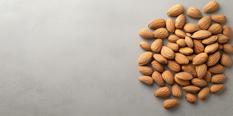 Wall Mural - Small pile of almonds neatly arranged on a smooth surface