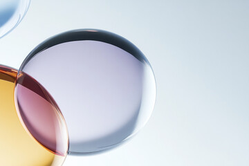 Poster - Two overlapping glass circles in gradient pastel hues create a delicate play of light and color, showcasing modern elegance.