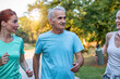 © Panorama - Active Senior men running in a group